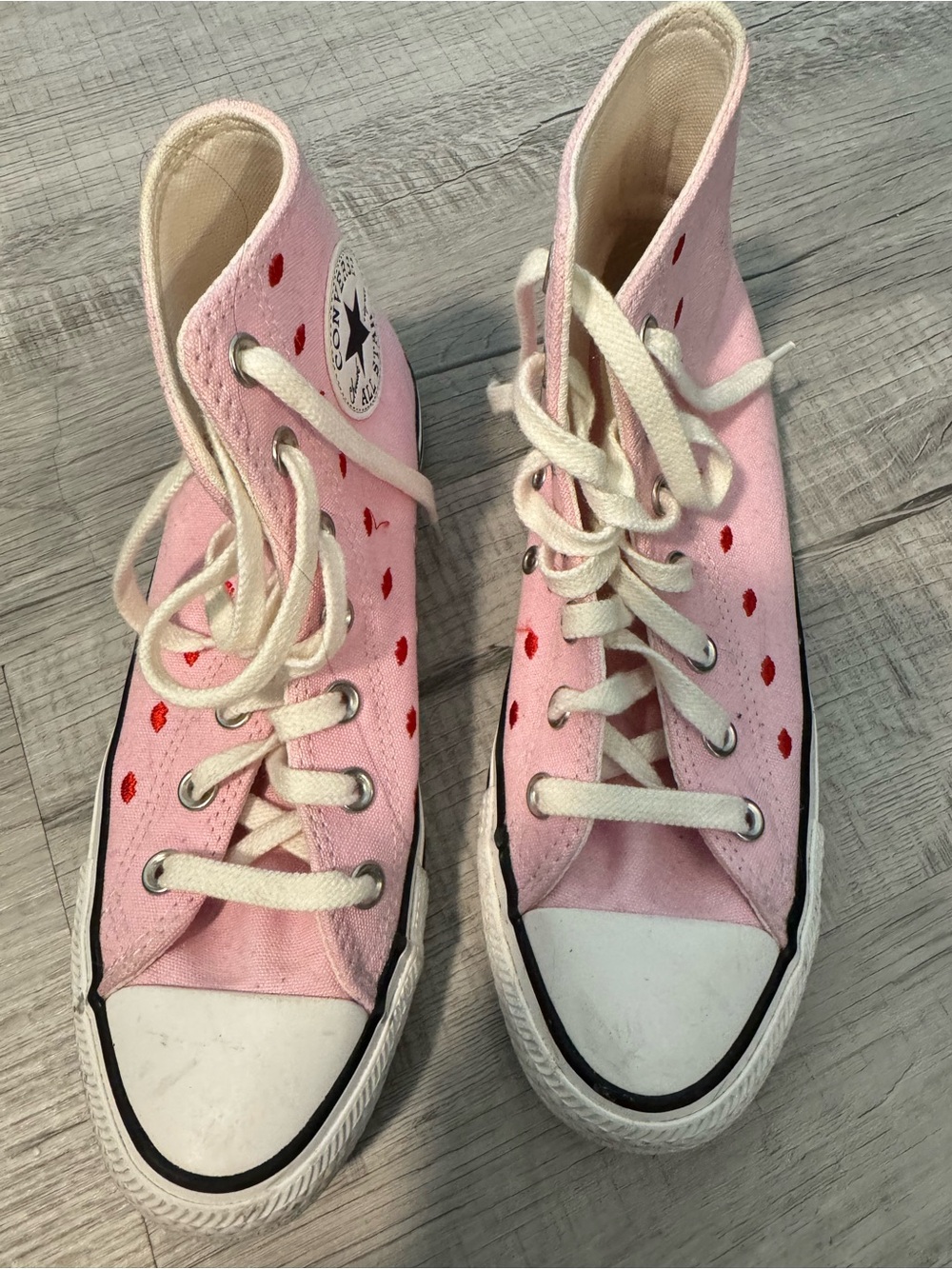 Converse Pink High-Top Sneakers with Red Heart Details
